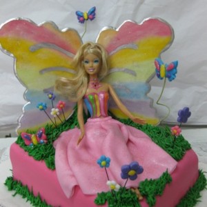 Barbie arcoiris sentada