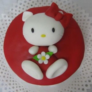 Hello Kitty de rojo acostada